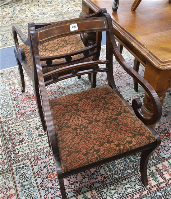 A set of four Regency mahogany dining chairs and a pair of Regency style brass inlaid elbow chairs (6)